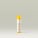 A tube of Tropic Lip Shade nourishing SPF 50 balm with a yellow cap and white body, labelled 'Certified Reef-Safe,' standing upright on a neutral background.